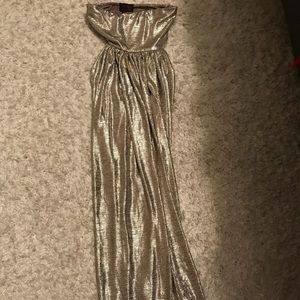 Flirty, gold tube top dress with slit